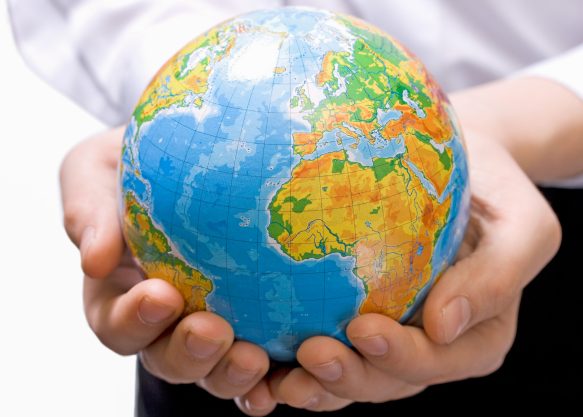 The globe in children's hands